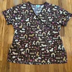 Size medium puppy dog scrub top ties in the back